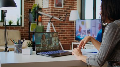professional-holding-qa-session-with-webinar-participants-via-videoconference